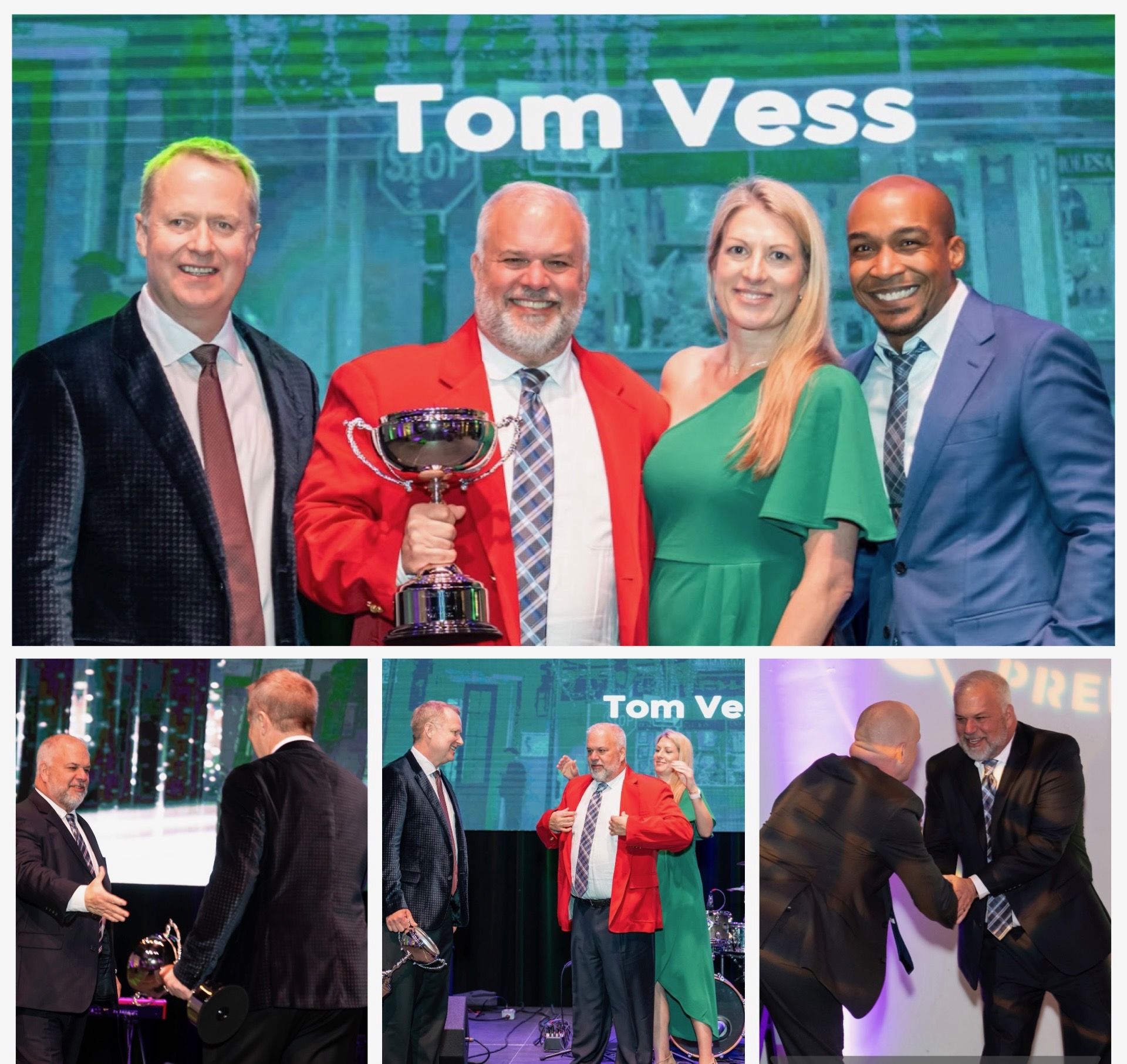 four people smiling for the camera and tom holding up a trophy